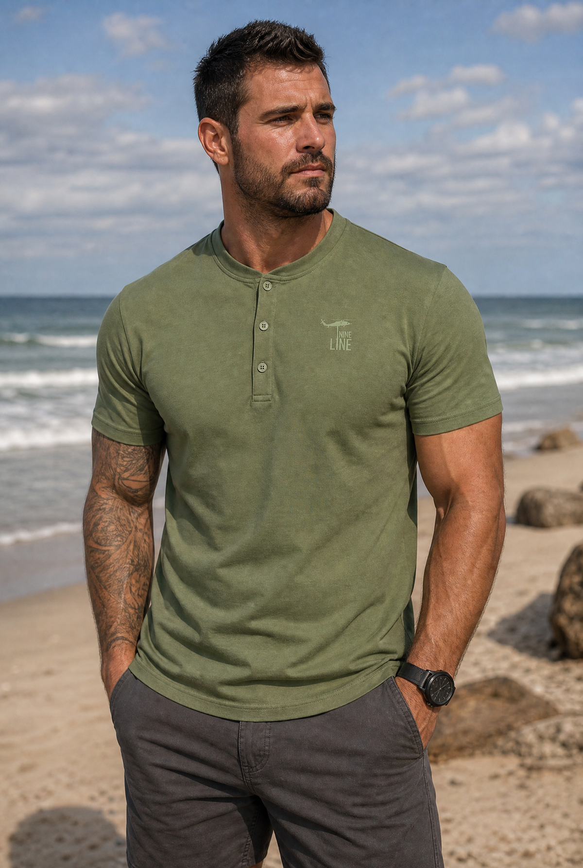 rugged man with imagery of a beach in background @Nine Line Short-Sleeve Henley