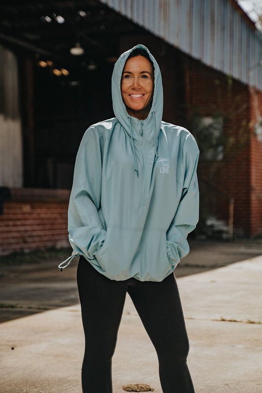 Women's Hooded 1/4 Zip Windbreaker - Nine Line Apparel